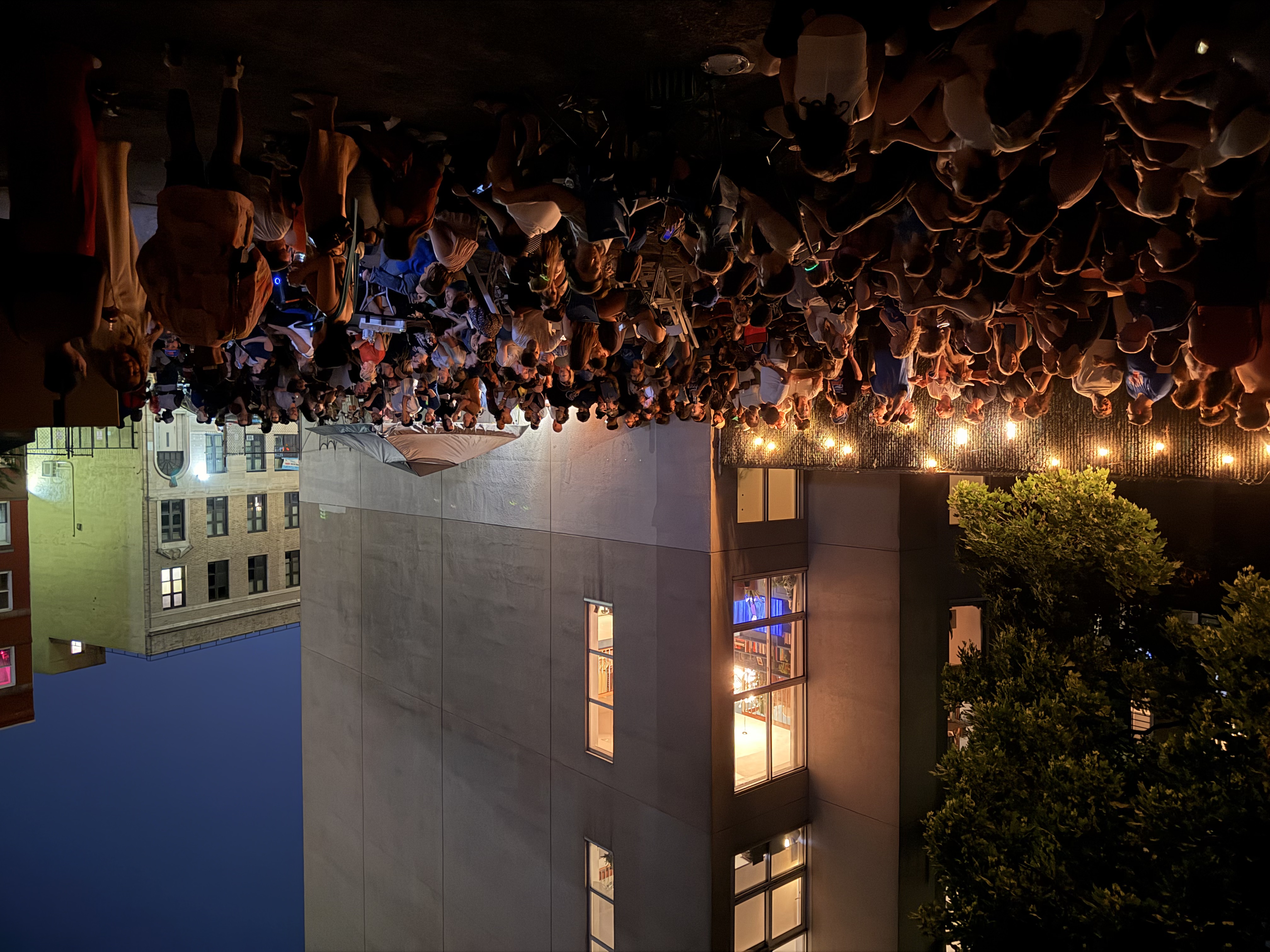 Crowd gathered at Sanders Studios Backyard for the NBA Finals Game 5 watch party