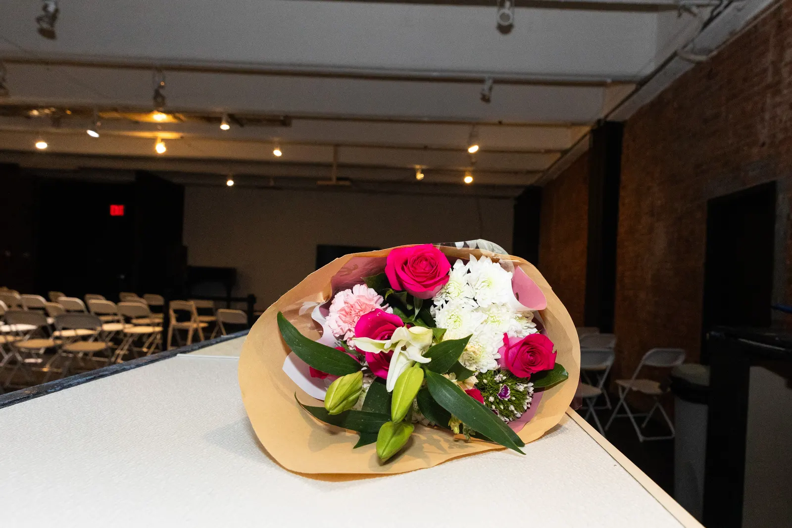 A bright bouquet rests beside the presentation room at Future of NYC Design.