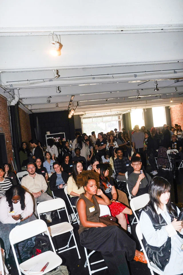A full audience listens to a presentation at Future of NYC Design.