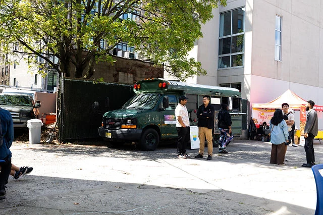 Guests arrive beside a food truck at the High Society event.